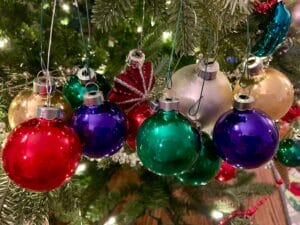 Cluttered ornaments on a Christmas tree